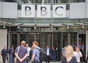 FILE - In this file photo dated Wednesday, July 19, 2017, an entrance to the headquarters of the publicly funded BBC in London. Britains government announced Wednesday Feb. 5, 2020, that it is considering a change in the way the nation's public broadcaster, the BBC is funded. (AP Photo/Frank Augstein, FILE)